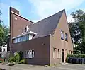 Woning boven winkelpand, zie ook Hoofdstraat 184-192