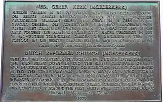 Informatiebord in het Afrikaans en het Engels