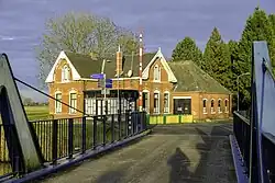 Voormalig café Schenkel gezien over de brug
