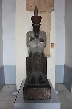 Mentoehotep II als Osiris Beeld van beschilderd zandsteen, Egyptisch Museum Vindplaats Deir el-Bahari door Howard Carter