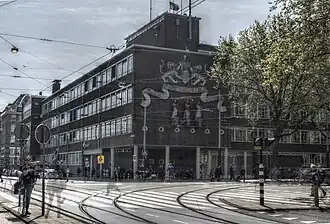 Elandsgracht 117 (mei 2017) met wapen en beelden