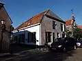 Oorspronkelijk een stadsboerderij op de hoek van de Ellestraat en de Westerwalstraat