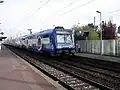 Een Z 20900 van de RER C in de nieuwe Transilien-kleurstelling op het Station Cernay, in Ermont (Val-d'Oise)