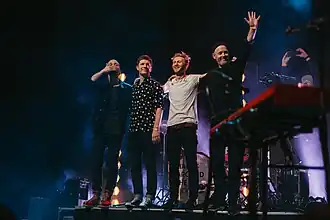 Ewert and The Two Dragons tijdens een optreden in Palladium Riga in 2019