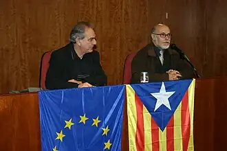 Fèlix Martí (rechts) tijdens een voordracht in Igualada in 2005