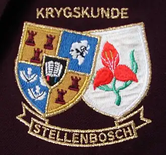 Het embleem van de Fakulteit Krygskunde