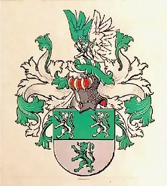 Familiewapen Van Gestel: Twee zilveren klimmende leeuwen op groene achtergrond boven een groene leeuw op zilveren achtergrond