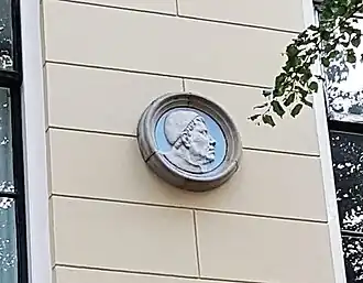 Artistieke impressie (1992) van Geert Grote op de gevel van de Latijnse school in Deventer