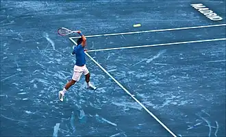 Winnaar Roger Federer op het blauwe gravel