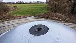 Impact van een holle lading op Koepel-Zuid