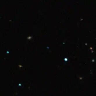 opname gemaakt door de New Technology Telescope, CFBDSIR 2149-0403 is de kleine blauwe stip in het midden.