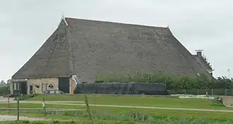 Kop-hals-rompboerderij in Lutjelollum