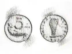 Frottage van een muntstuk