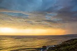 zonsondergang met storm bij Gracetown