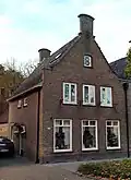 Woon- en winkelhuis