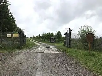 Hekwerk bij ingang buitenmuseum