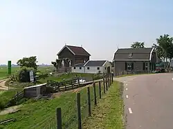 Het gemaal dat het water uit de polder in de Waver pompt.