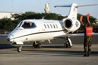 General_Merrill_McPeak_flying_a_Learjet_C-21A