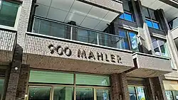 Belettering aan de entree aan de George Gershwinlaan