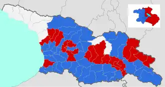 Meeste stemmen in de eerste ronde per district: Zoerabisjvili (blauw) en Vasjadze (rood)