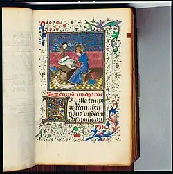 De heilige Marcus schrijvend aan zijn evangelie in gezelschap van zijn symbooldier, de leeuw