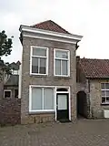 Winkel met woning