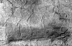 petrogliefen die mogelijk een gezin afbeelden
