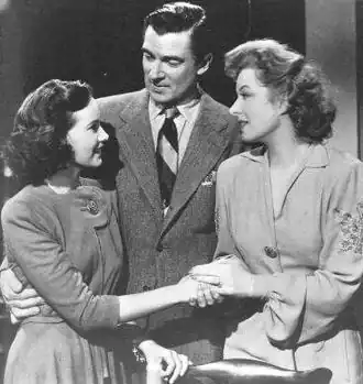 Publiciteitsfoto voor Mrs. Miniver, met Teresa Wright, Walter Pidgeon en Greer Garson