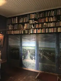 De wandschildering in de Groene Bibliotheek van Oosterhouw