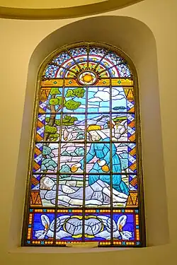 Glas-in-loodraam uit 1915 met Het offer van Abraham