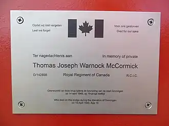 Plaquette ter nagedachtenis aan Tom McCornick