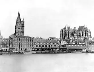 De kerk vanaf de Rijn in 1856 met de nog onvoltooide dom