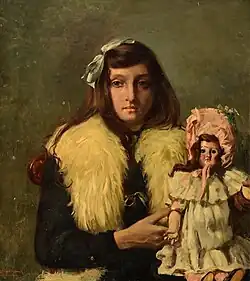 Portret van een meisje met een pop