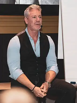 Guy Penders geeft een lezing in het Vlaemynck Business Center in 2023