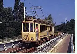 HTM 58 op het viaduct te Amstelveen van de Electrische Museumtramlijn Amsterdam; 29 juli 1984.
