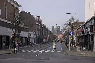 Tempeliersstraat in 2016 met op de achtergrond de toren van de Kathedrale basiliek Sint Bavo.