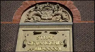 Plaque boven de hoofdingang