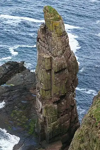 Brandingpilaar voor de kust van Handa