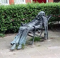Kunstwerk Man in ligstoel (Hans Mes, 1984)