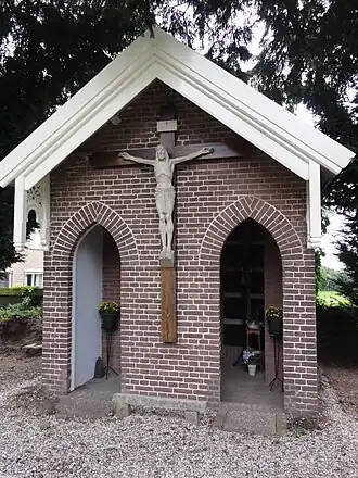 Baarhuis met calvarieberg