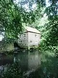 Watermolen bij dit kasteel