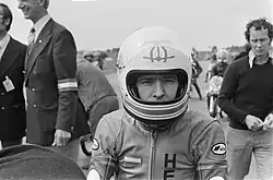 Henk van Kessel op de Van Veen-Kreidler in 1974. Op de achtergrond (rechts) voormalig wereldkampioen Jan de Vries.