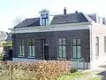 Vrijstaande blokvormige villa "Beukenheim"