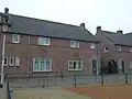 Poortgebouw met woningen