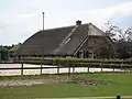 Boerderij, schuur en hooiberg