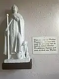 Het beeld van de Heilige Dominicus in de kapel tot wie men bidt voor genezing van de "koeke".