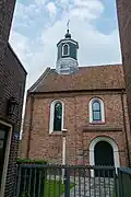 Doorkijkje naar de kerk vanuit het zuiden (2014)