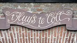 Naambord aan de noordgevel