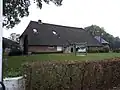 Boerderij met hooiberg en schuur