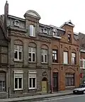 Winkelhuis en twee burgerhuizen